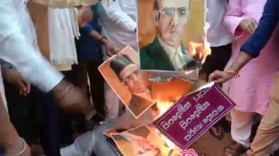 Congress threw eggs at Savarkars photo, trampled on it and set it on fire