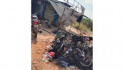 In tumakur, Naked man in the temple fire to the bikes