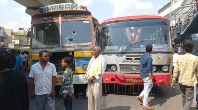 Bike stuck between lorry-bus: A woman died in Bangalore