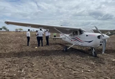 The pilot landed the plane on the farm due to a technical error