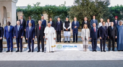 G-7 Summit: Prime Minister Narendra Modi takes center stage during a photo shoot